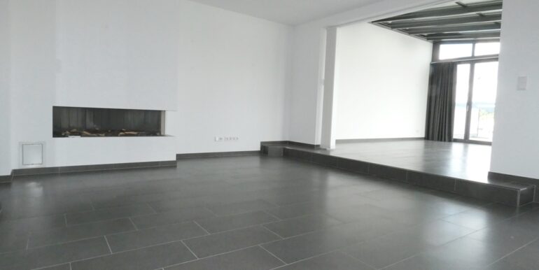 Wohnzimmer mit Kamin